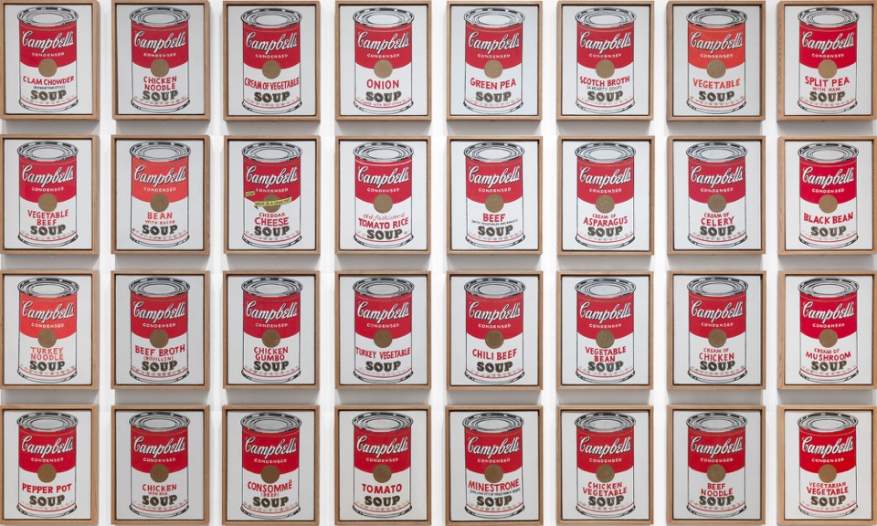 Thirty-two paintings of Campbell’s soup cans arranged in four rows of eight.